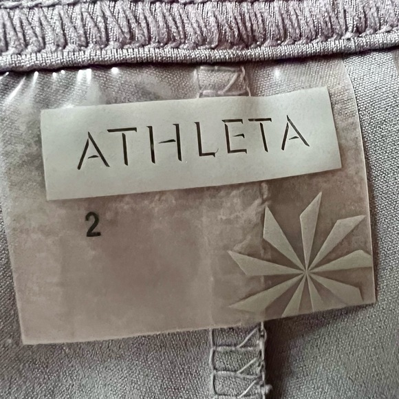 Athleta skort with small button front pocket and tie front bow. - Picture 5 of 6